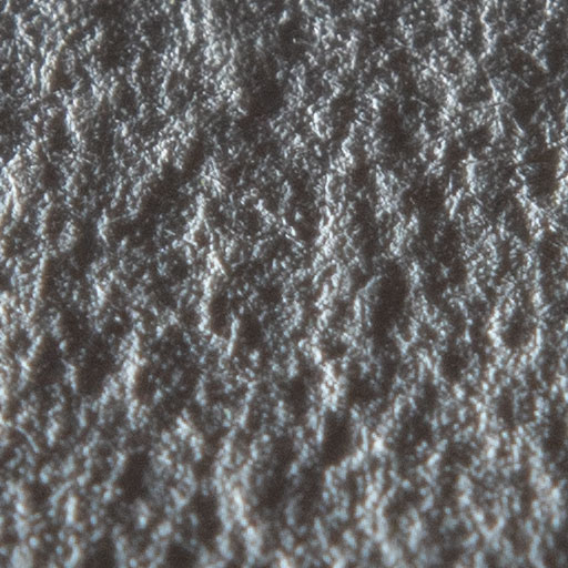 Texture d'une feuille de papier Canson blanche en lumière rasante